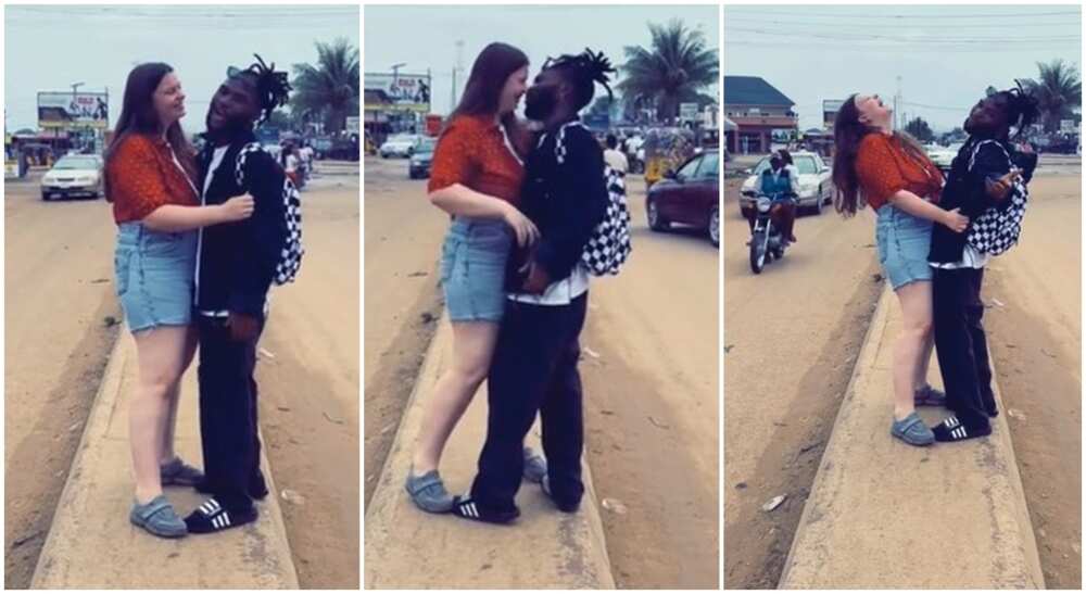Photos of a Nigerian man and his his white lover in a public display of affection.
