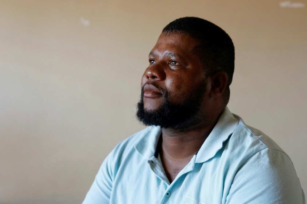 Mzoxolo Magidiwana, 34, was shot nine times but survived Mzoxolo Magidiwana, 34, was shot nine times but survived