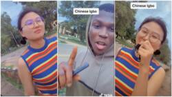Chinese lady answers Nigerian man in Igbo language while walking, their video stirs reactions