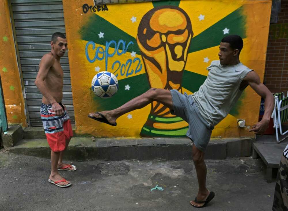 World Cup fever is heating up in Rio de Janeiro's biggest favela, Rocinha -- and across Brazil