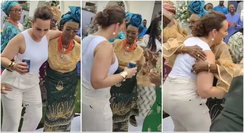 Photos of an Oyinbo lady lady dancing with an old woman.