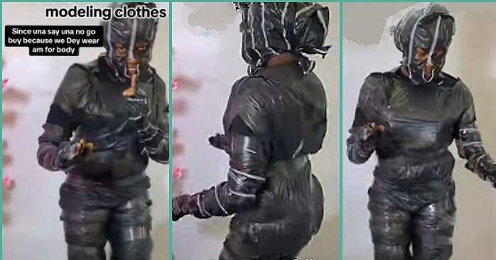Thrift seller wraps herself with cellophane to model clothes