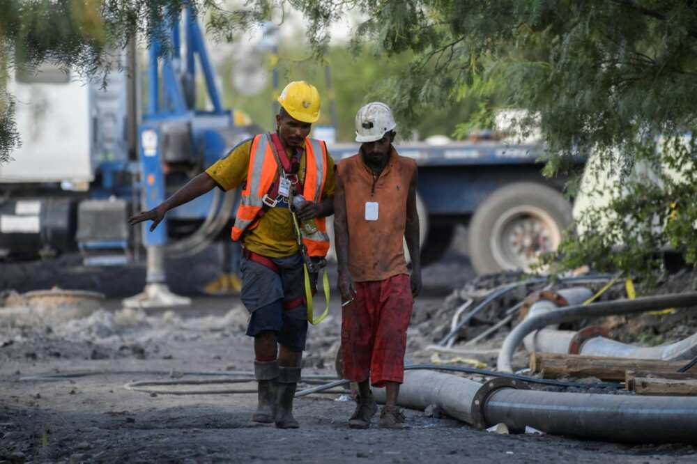 Volunteer miners take part in a rescue operation in northern Mexico