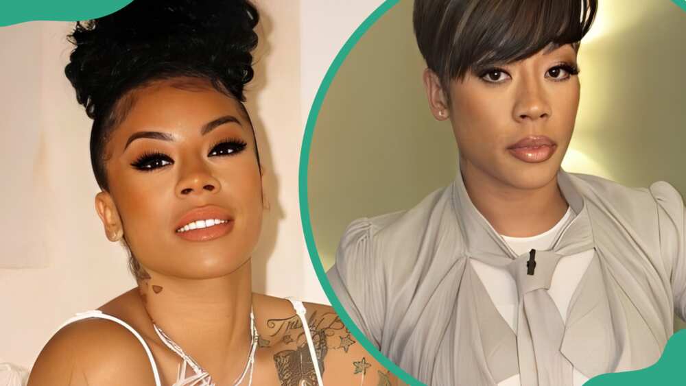 Keyshia Cole poses for a photo in a white and light grey outfit