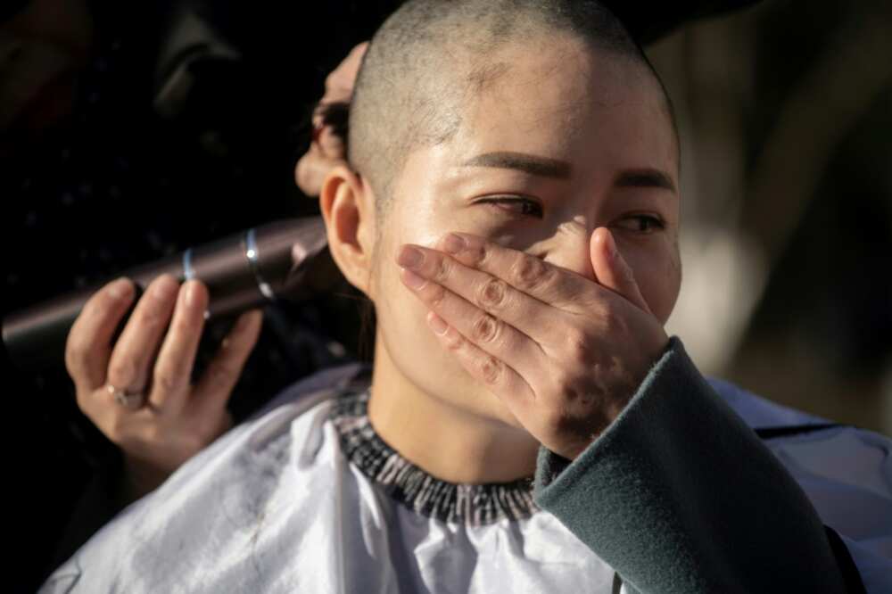 Li Wenzu had her head shaved in 2018 to protest the detention of her husband and human rights lawyer Wang Quanzhang