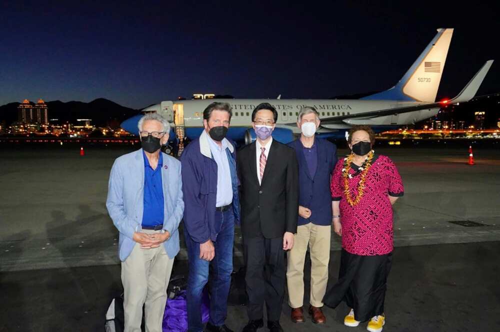 A US congressional delegation poses with Taiwanese diplomat Douglas Yu-tien Hsu (C) after arriving in Taipei on Sunday