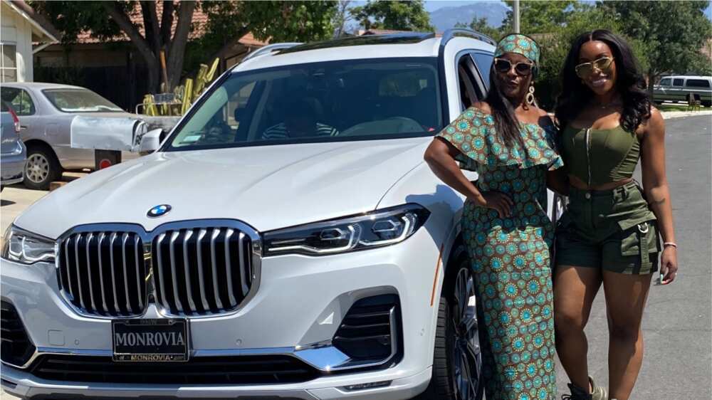 A picture showing the new car, the mother and daughter. Photo source: Twitter/Jackie Aina