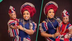 "This is lovely": Woman and her son slay in matching aso-oke outfits, give family goals