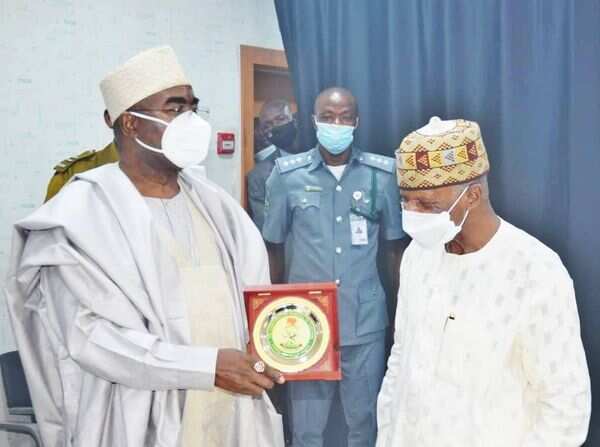 NDLEA boss, Marwa presenting an award to the head of NCS, Hameed Ali