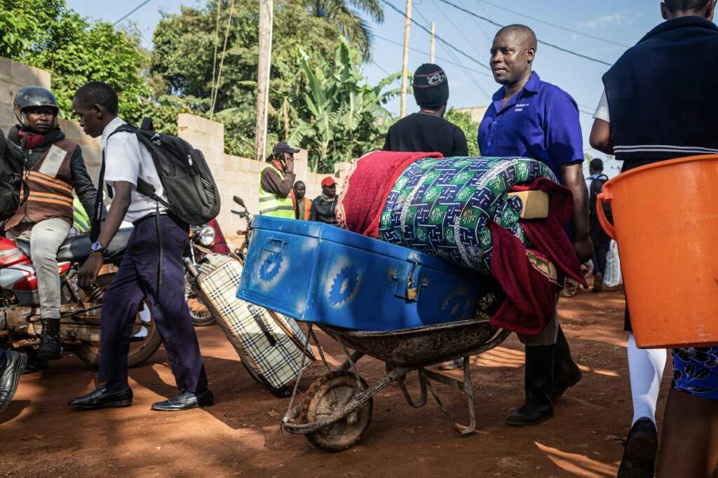 Uganda closes schools to fight Ebola, new cases fall