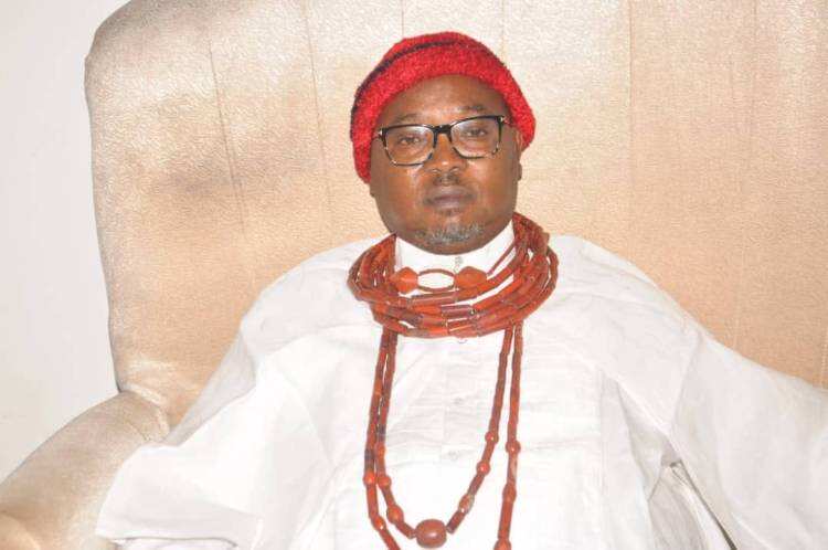 Chief Denis Omovie in his traditional attire