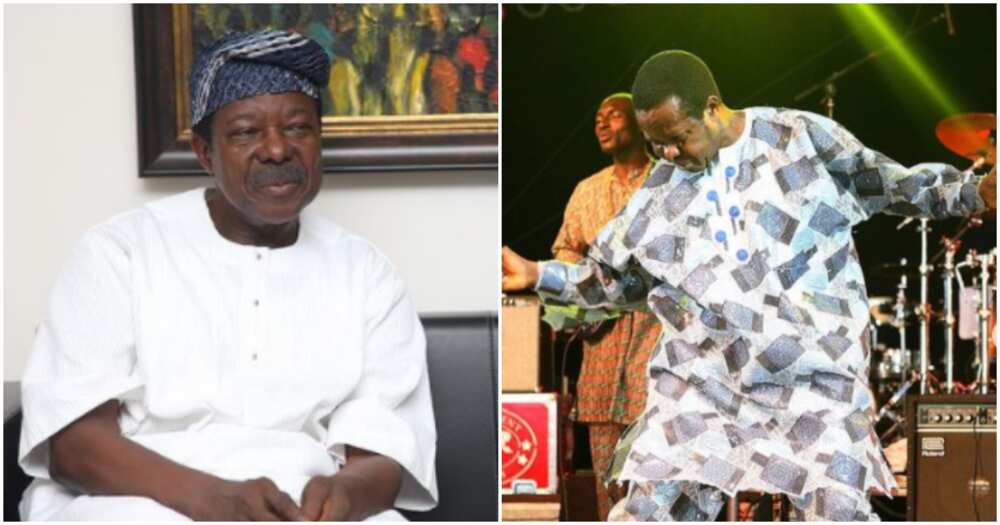King Sunny Ade cautions crew member on stage.