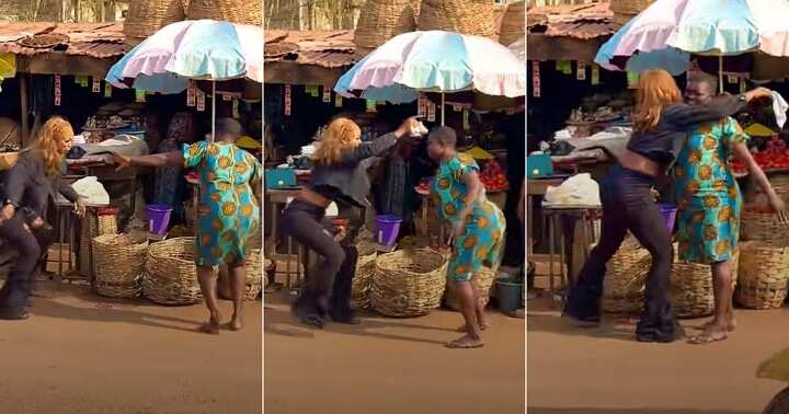 Lady dances with market woman, Igbo song