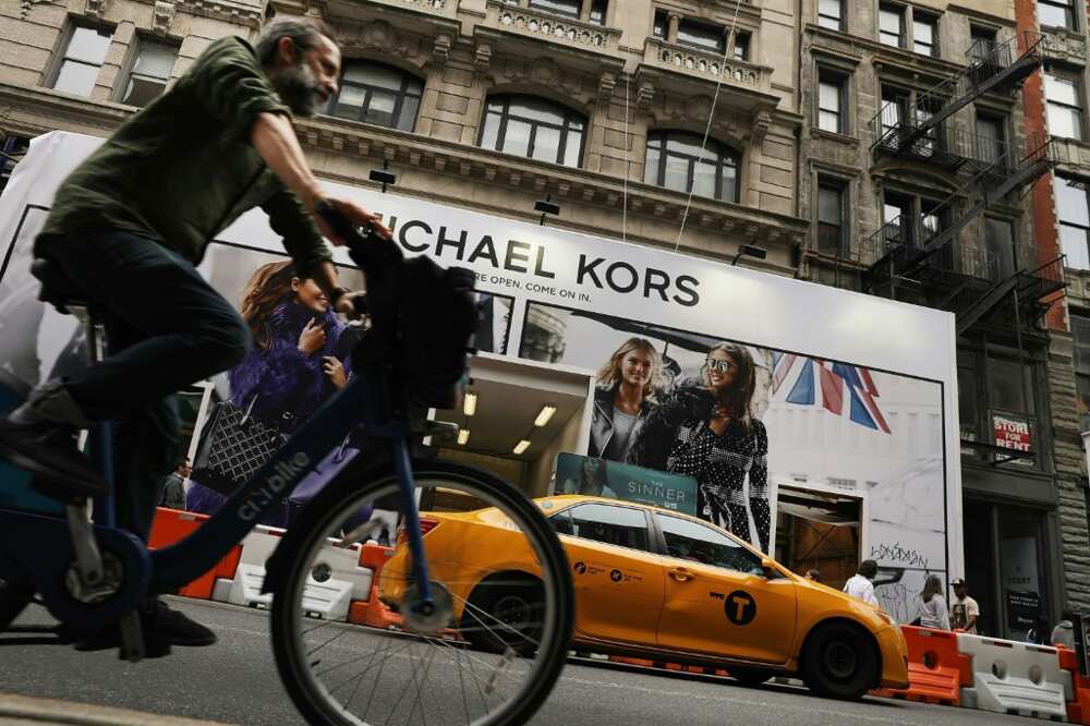 Coach owner's Michael Kors deal creates US giant to take on