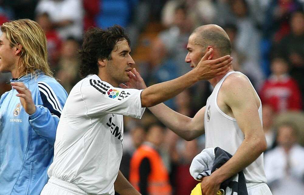 Raul Gonzalez and Zidane in action