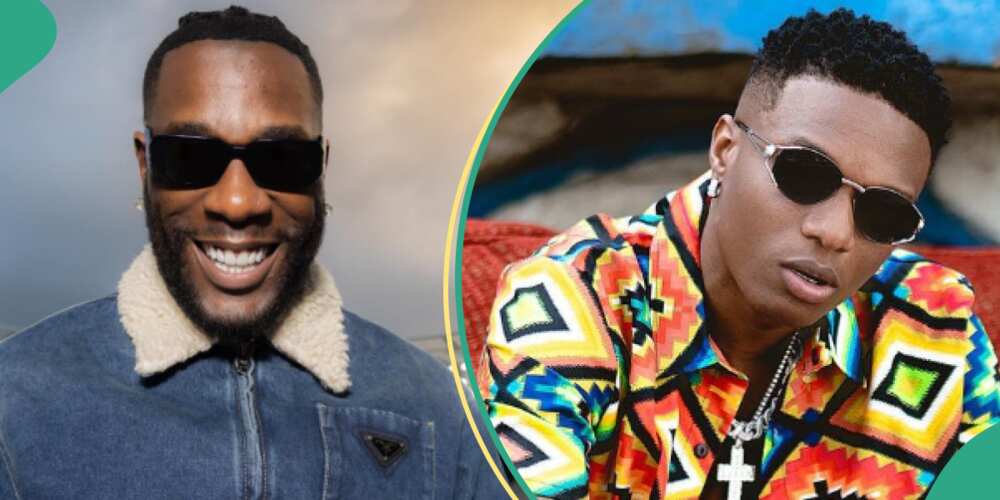 Burna Boy and Wizkid meet at club, hug and chat in viral video.