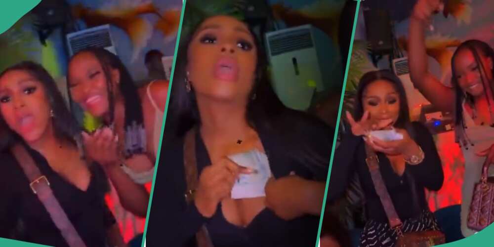BBNaija: Ilebaye sprays dollars on Mercy Eke. BBNaija: Ilebaye sprays dollars on Mercy Eke.