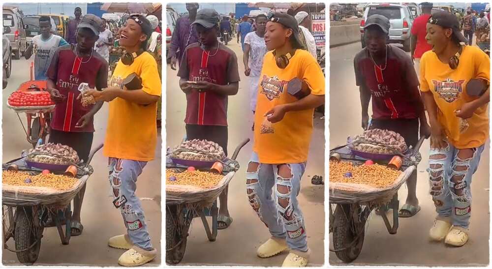 Photos of a lady dancing front of a man who hawks tiger nuts in a wheelbarrow.