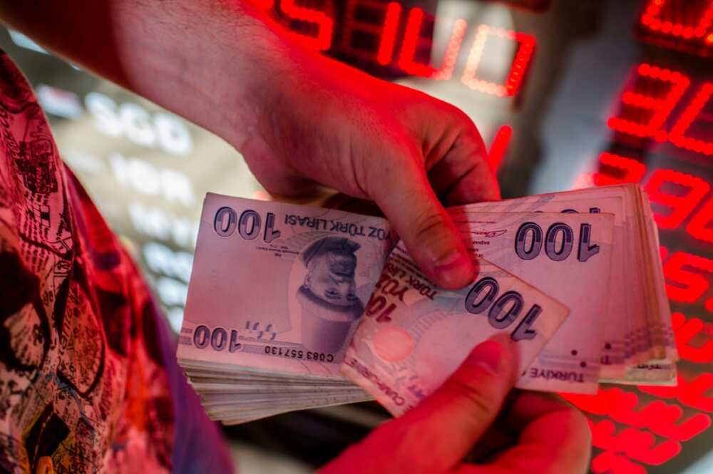 The Turkish lira's slide are accelerating after a 50-percent drop against the dollar in the past 12 months The Turkish lira's slide are accelerating after a 50-percent drop against the dollar in the past 12 months