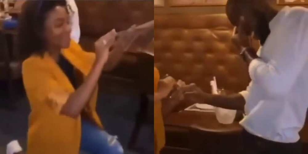 Lady goes down on her knees to propose marriage to her longtime boyfriend in public Lady goes down on her knees to propose marriage to her longtime boyfriend in public