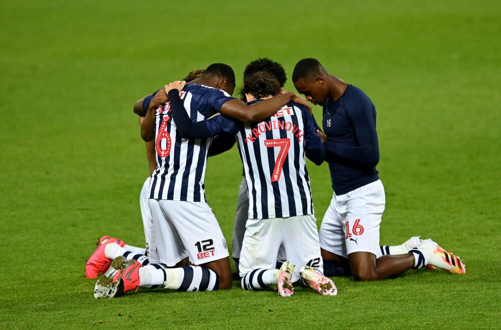 Semi Ajayi and WBA teammates pray to God after getting Premier League promotion