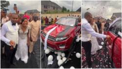 "He must be earning in dollars": Nigerian man gifts wife brand new Range Rover on wedding day