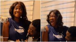 I wan faint: Mercy Johnson sits on hubby’s lap, cries like a baby as she receives 2 vaccine shots