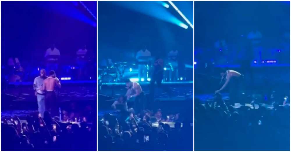 Wizkid reacts as fan runs on stage to hug him at MSG show.