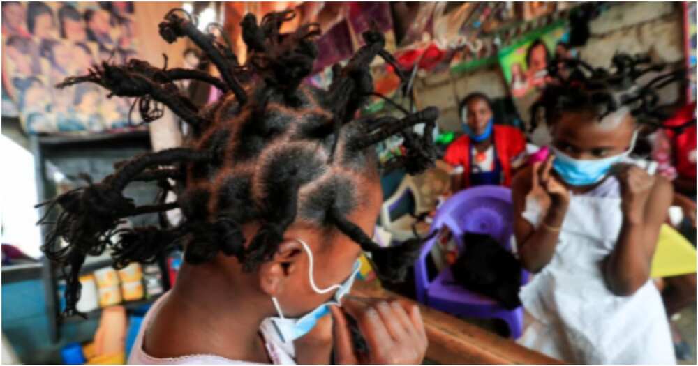 Nairobi hairdressers invent new spiky style resembling coronavirus to create awareness