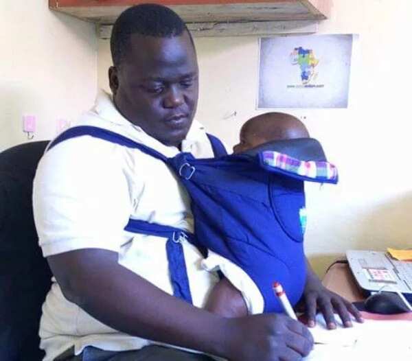 This man, said to be Silas Odhiambo from Kisumu, takes his baby to work