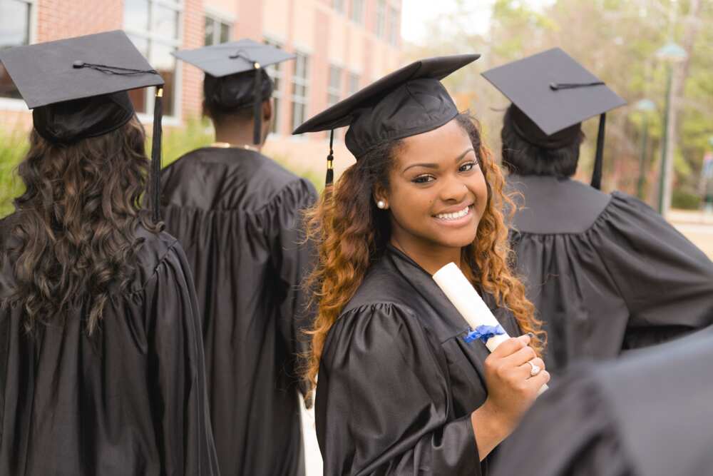 A female excited after the college graduation ceremony