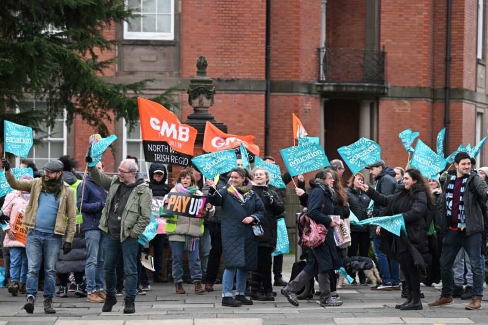 Teachers take part in a trade union protest in Manchester, northern England