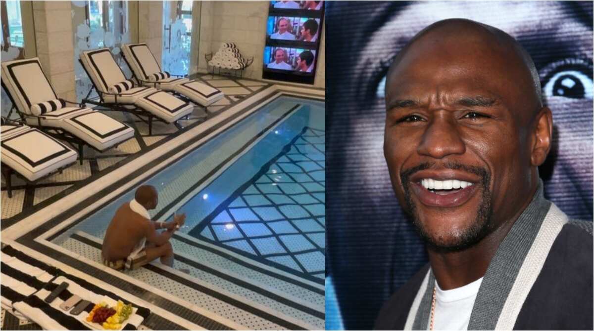 Money man: Mayweather gives fans a glimpse of his £8m mansion with gigantic swimming pool (video)