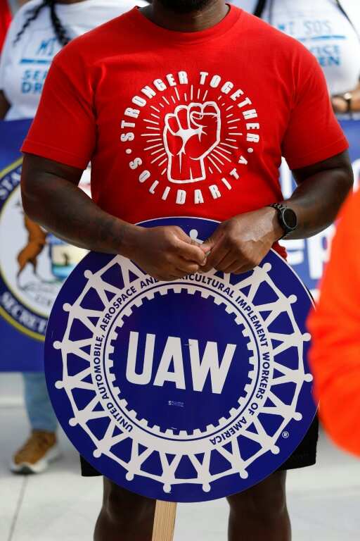 The prospect of a strike by an emboldened United Auto Workers union has dampened the mood at this year's Detroit Auto Show