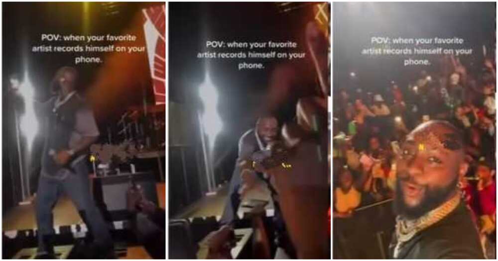 Photos of Davido on stage using a phone to record himself