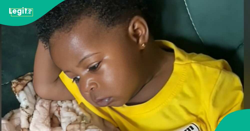Nigerian kid in funny deep thought