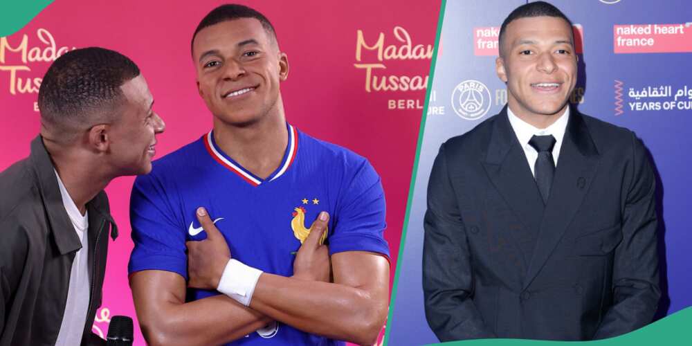Kylian Mbappe reacts on seeing an artwork that looks like him