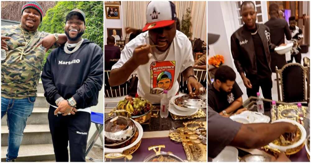 Davido eats at Cubana Chiefpriest's home