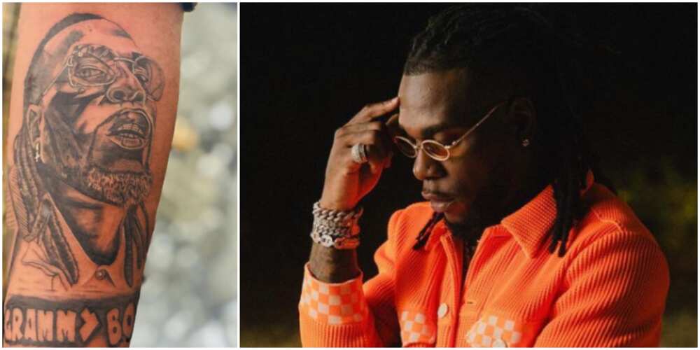 This is lit: Nigerians react as die-hard fan tattoos Burna Boy's face on his arm