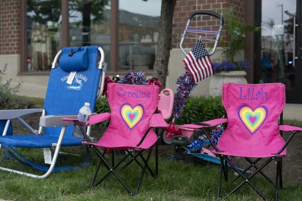 Lawn chairs stand at the scene of the Fourth of July parade shooting in Highland Park, Illinois on July 4, 2022