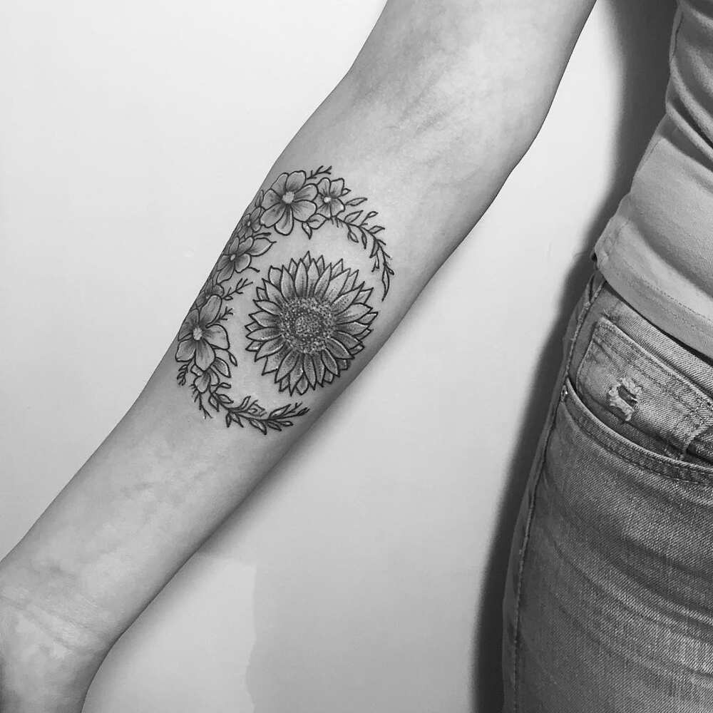 sunflower wrist tattoo