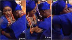 Emotional video shows a Nigerian groom on his knees crying hard at his traditional wedding, bride comforts him