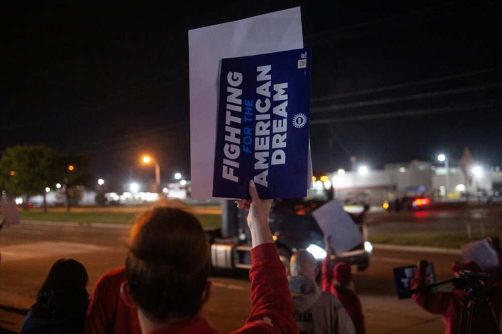 UAW members picket outside of the Local 900 headquarters across the street from the Ford assembly plant in Wayne, Michigan UAW members picket outside of the Local 900 headquarters across the street from the Ford assembly plant in Wayne, Michigan