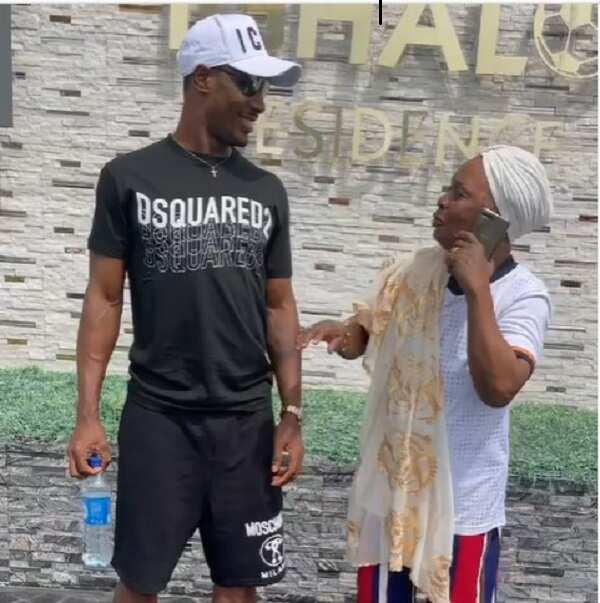 Odion Ighalo Jokes About Letting Go of Mother After She Photobombed Him in His Lekki Mansion