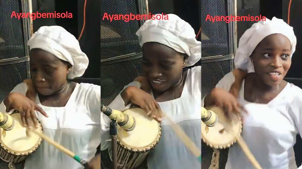 Photo of young lady drumming effortlessly Photo of young lady drumming effortlessly