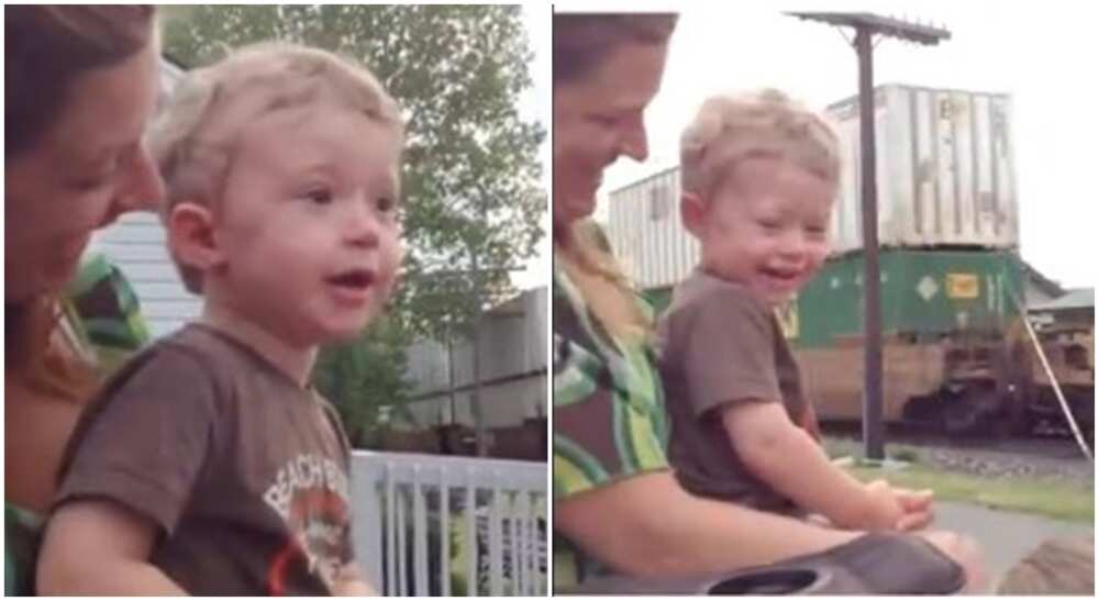 Boy becomes happy after seeing his dad who drives train.