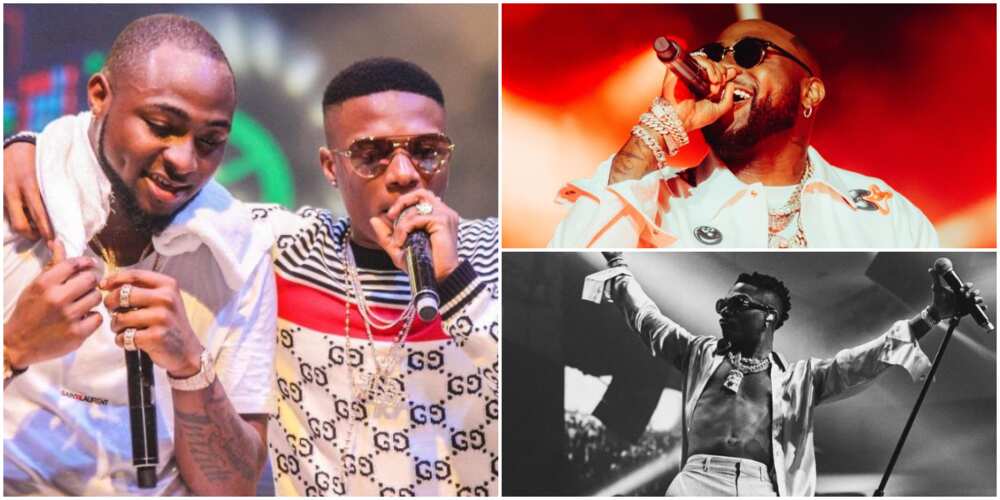 Wizkid and Davido stand inches away from each other inside Ghana club