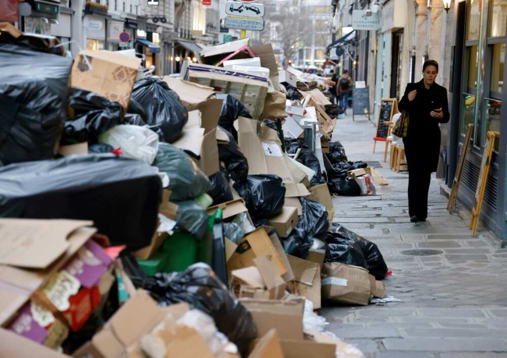 Garbage is piled up several metres high in some areas of Paris due to a strike by municipal waste collectors