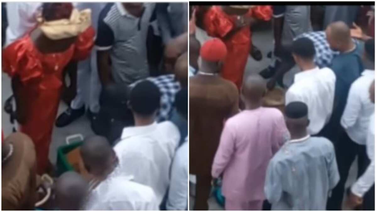 Caterer tries to smuggle cooler of jollof rice from party, Nigerians catch her in viral video