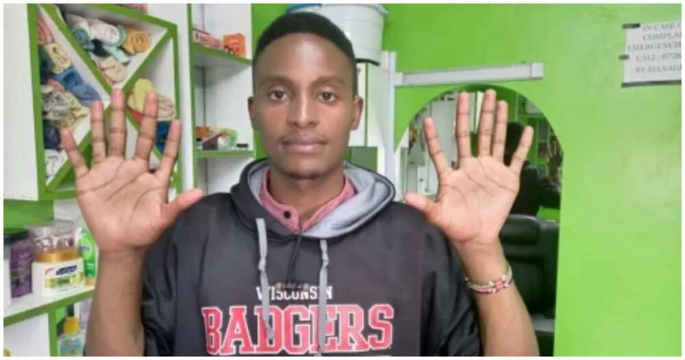 James Kamau, 6 fingers on both hands, masseur, Nakuru County, Kenya, 28-year-old